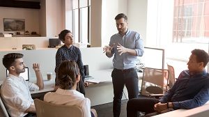 man discussing in a meeting | select a community association management company