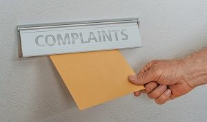 A letterbox with the inscription Complaints | hoa rules and regulations