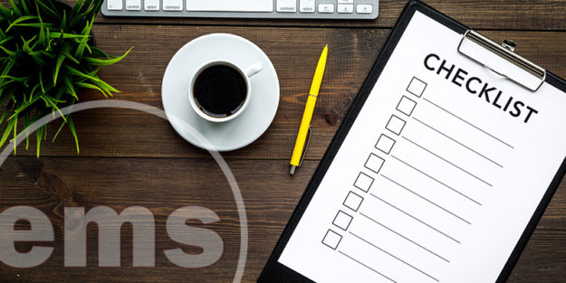 homeowners annual checklist with space for ticks on pad on office desk | HOA year end checklist