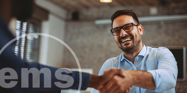 Close up of handshake in the office | selecting HOA vendors