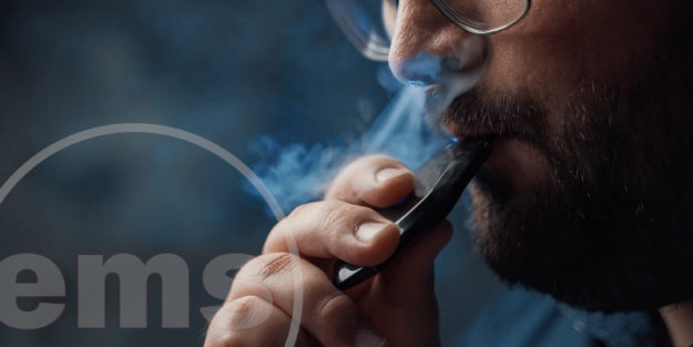 close up of vaping bearded man | HOA vaping rules