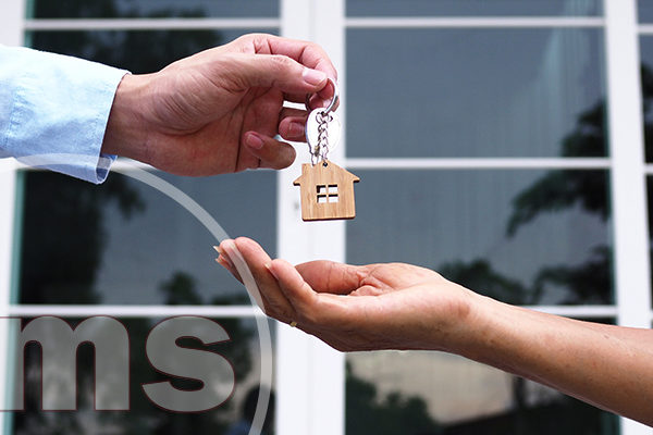 How Should The Board Handle Short-Term Rentals In HOA Communities renter are taking home keys from hoa board | short-term rentals