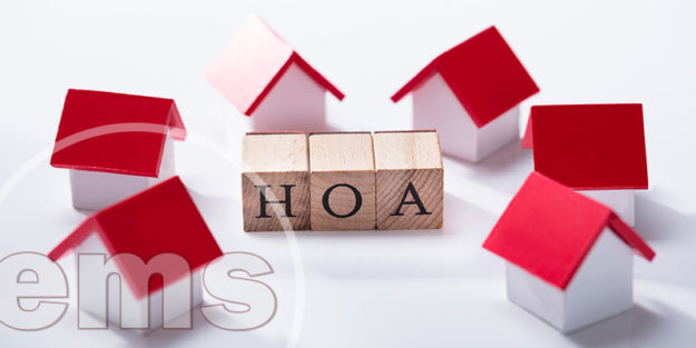 Homeowner Association Wooden Block Surrounded With House Models |