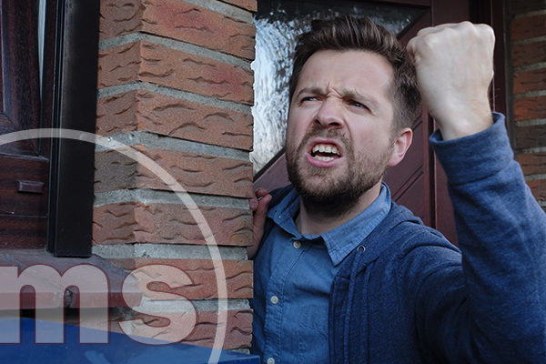 When Neighbors Fight: Handling HOA Neighbor Disputes Fairly upset young male neighbor with fist in air yelling | hoa neighbor disputes